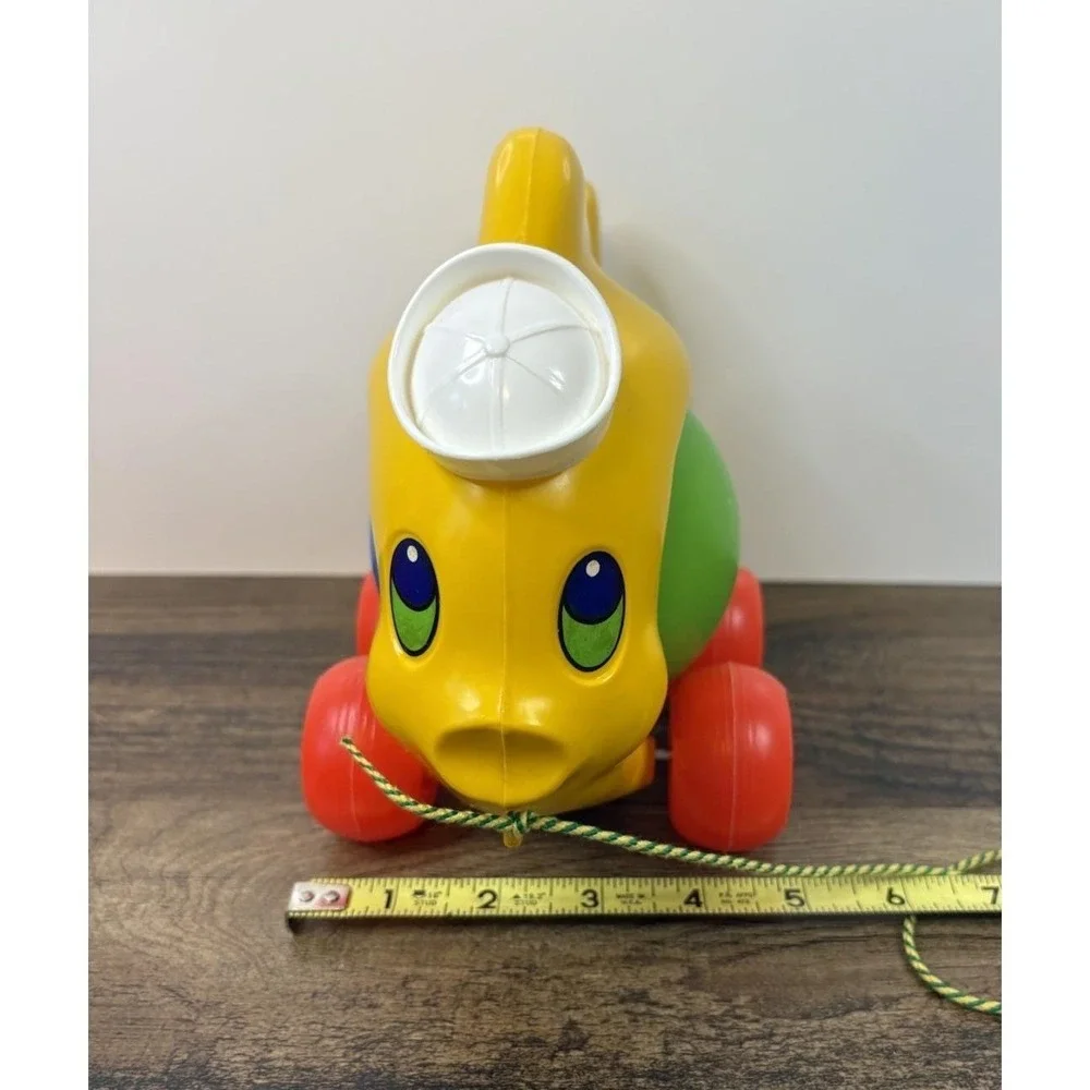 Vintage Pull Along Fish Toy Rolling Ball Rattle Plastic Sailor Hat